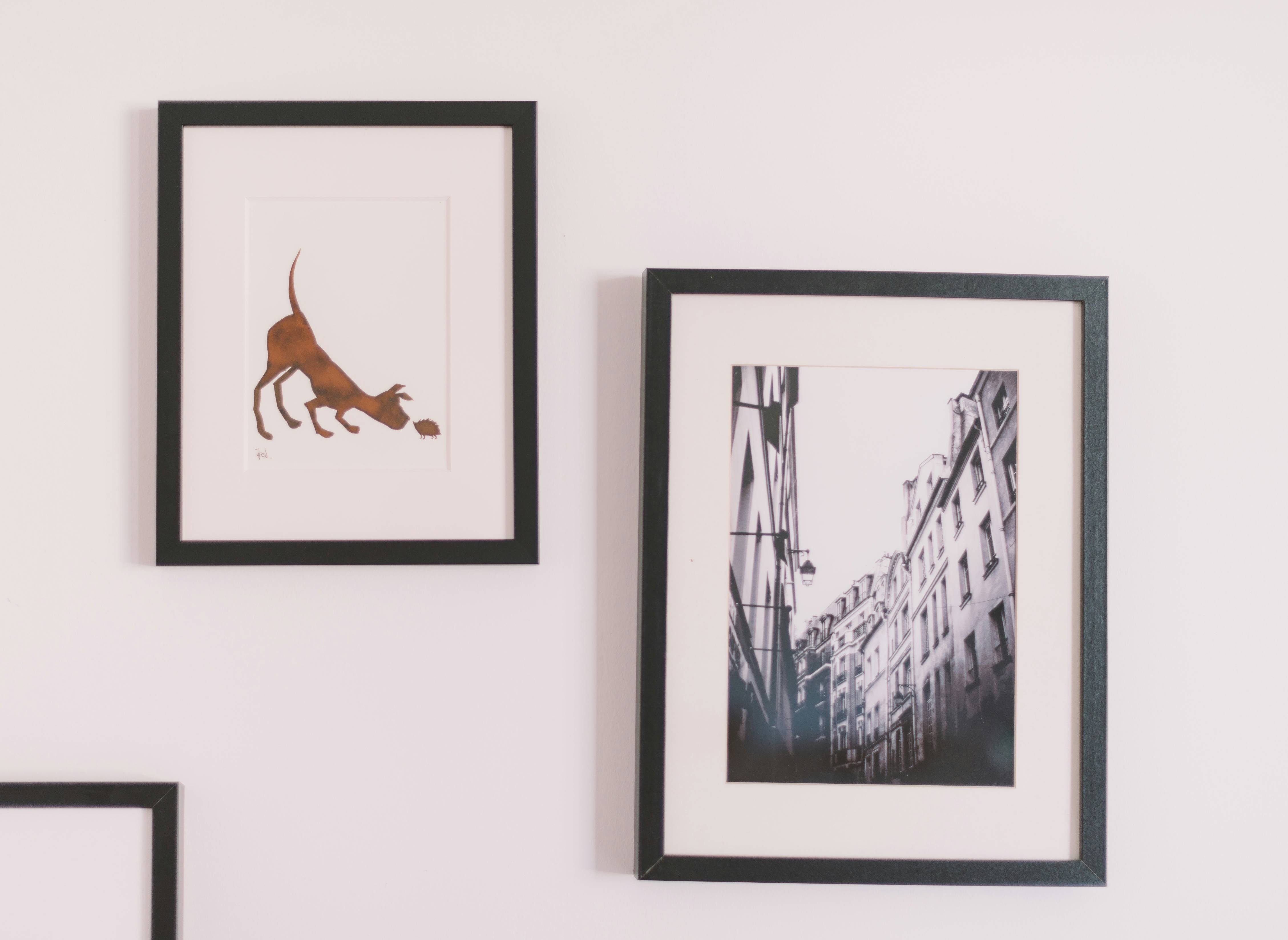 two assorted wall decors
