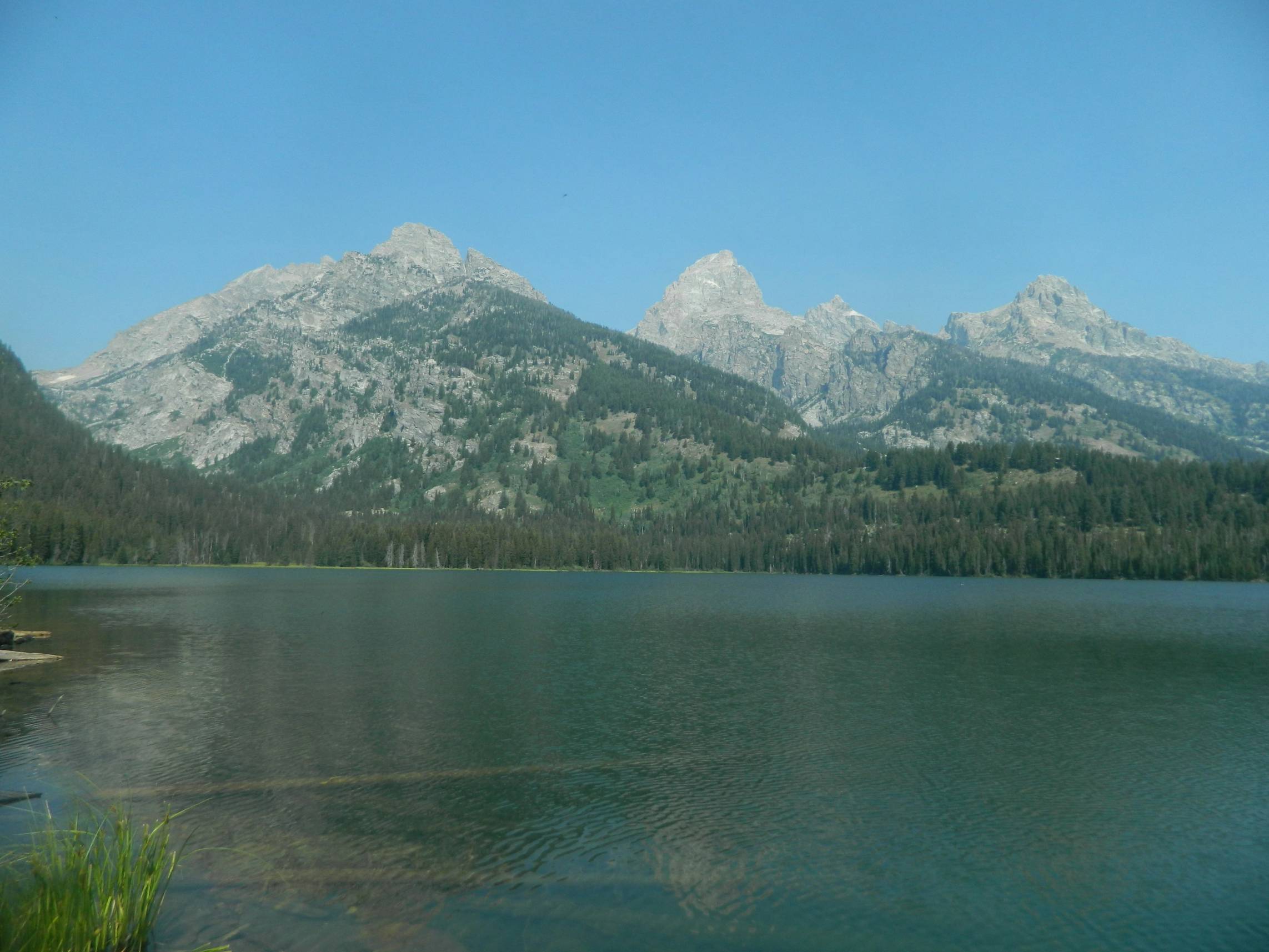 a large body of water surrounded by mountains