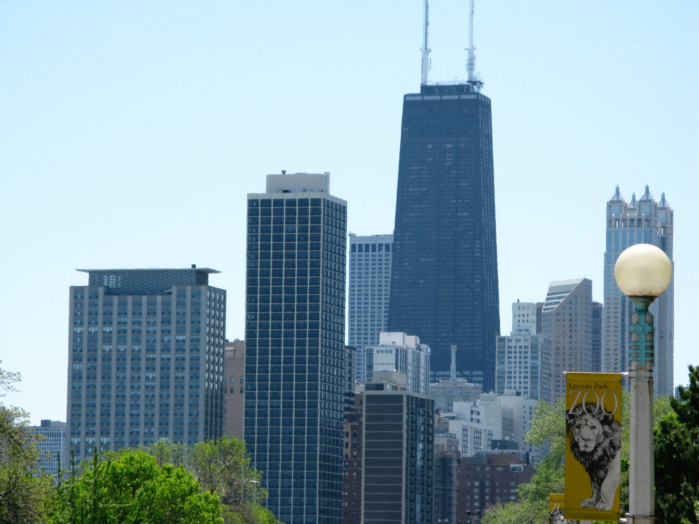 a view of a city with tall buildings in the background