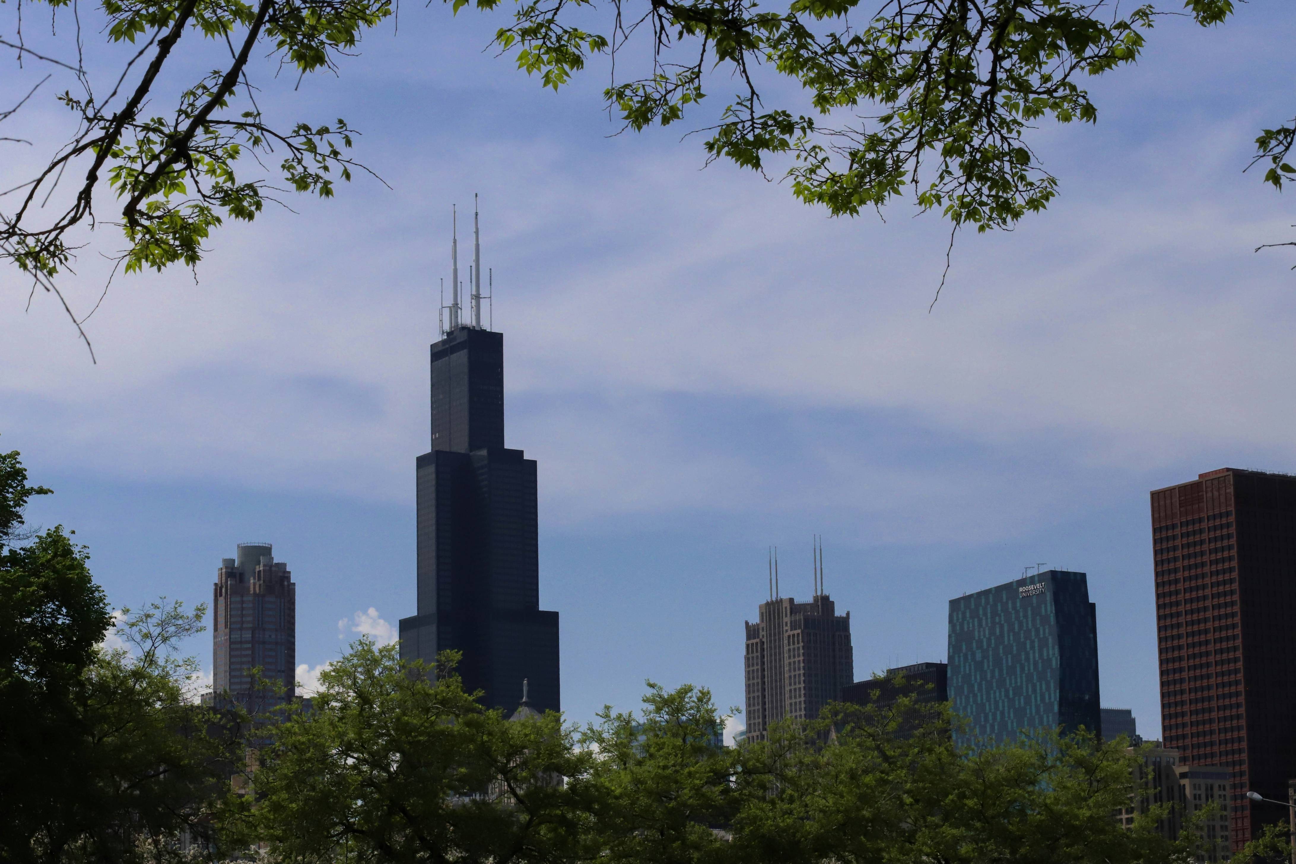 a view of a city with tall buildings